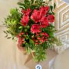 Ramo de flores en tonos rojos